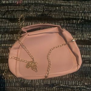 Small min bag pastel pink with gold writing